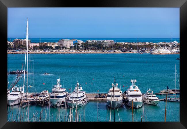Yachts in French Riviera and Cannes City Skyline Framed Print by Artur Bogacki