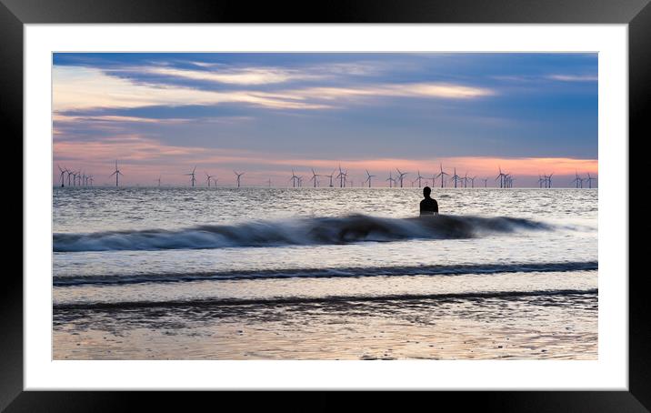 Waves splash against an Iron Man at high tide Framed Mounted Print by Jason Wells