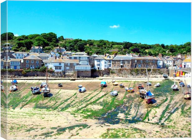 Mousehole at low tide in Cornwall. Canvas Print by john hill