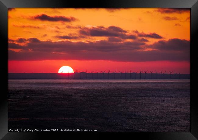 A Wind Farm Sunset Framed Print by Gary Clarricoates