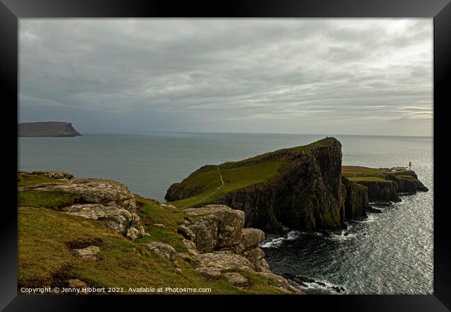 Neist Point lighthouse in the distance Framed Print by Jenny Hibbert