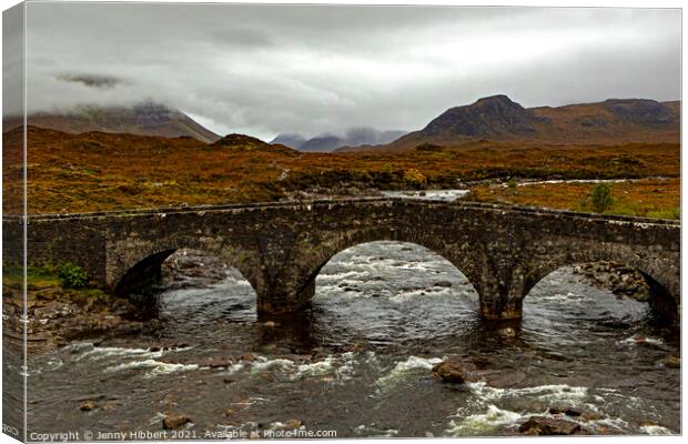 View of Sligachan bridge with the Cuillin mountains Canvas Print by Jenny Hibbert