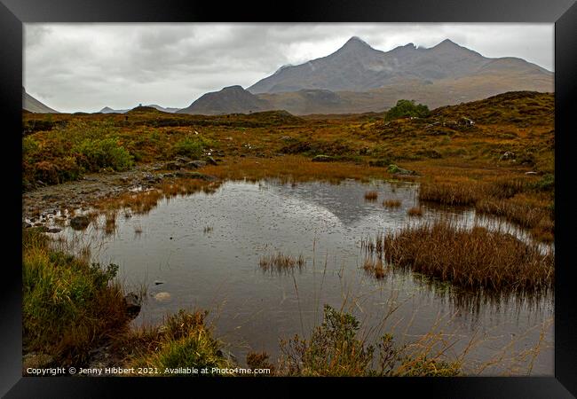 Pond next to Sligachan bridge with the Cuillin mountains in the distance Framed Print by Jenny Hibbert