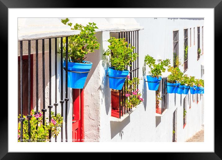 Blue plant pots against whitewashed walls,  Framed Mounted Print by Kevin Hellon