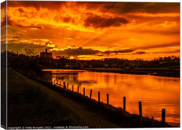 Warkworth Castle at Sunset on the river Wansbeck,  Canvas Print by Holly Burgess