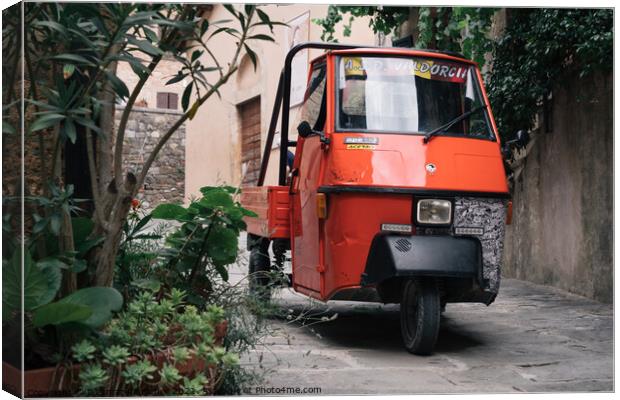 Piaggio Ape 50, a three-wheeled light commercial vehicle in Ital Canvas Print by Dietmar Rauscher