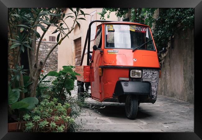 Piaggio Ape 50, a three-wheeled light commercial vehicle in Ital Framed Print by Dietmar Rauscher