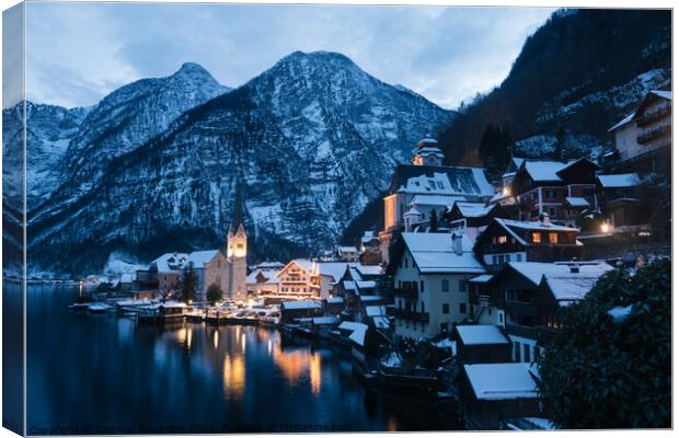 Hallstatt Cityscape on a Winter Evening Covered with Snow Canvas Print by Dietmar Rauscher