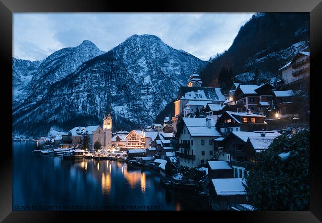 Hallstatt Cityscape on a Winter Evening Covered with Snow Framed Print by Dietmar Rauscher