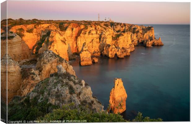 Ponta da Piedade farol Lighthouse in Lagos at sunset, in Portugal Canvas Print by Luis Pina