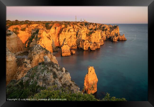 Ponta da Piedade farol Lighthouse in Lagos at sunset, in Portugal Framed Print by Luis Pina