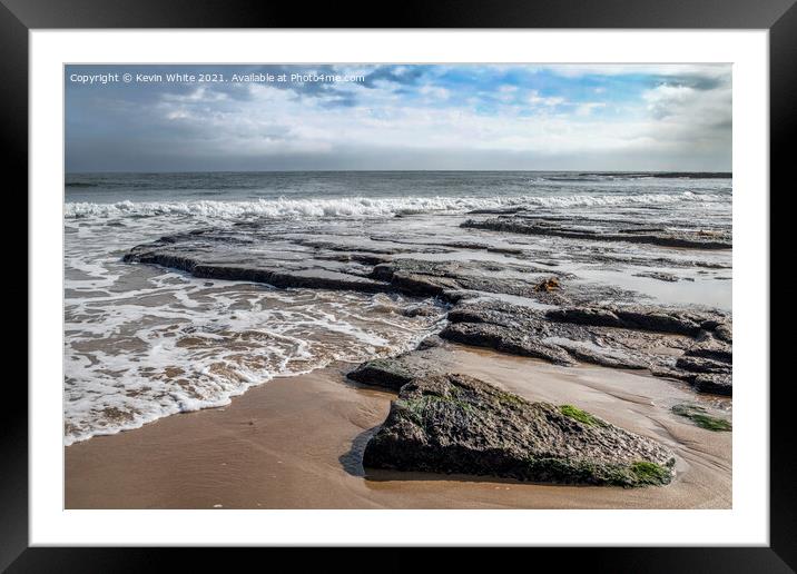 Rain clouds build over Embleton beach Framed Mounted Print by Kevin White
