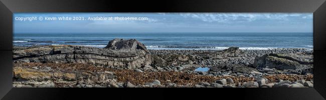 Greymare Rock Dunstanburgh Framed Print by Kevin White
