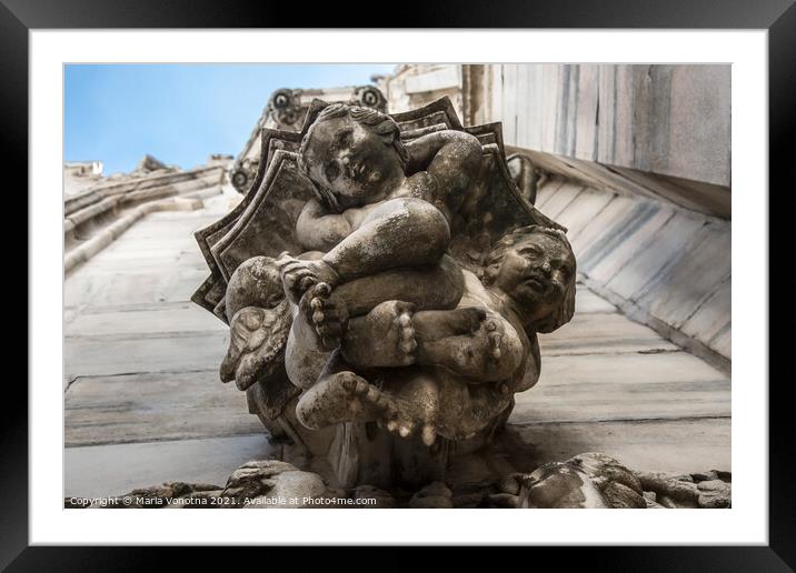 Stone sculpture of little angels Framed Mounted Print by Maria Vonotna