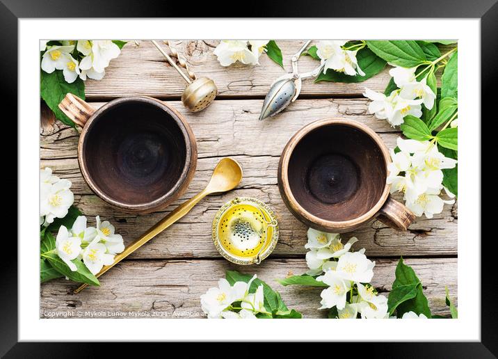 Jasmine tea with jasmine flower Framed Mounted Print by Mykola Lunov Mykola