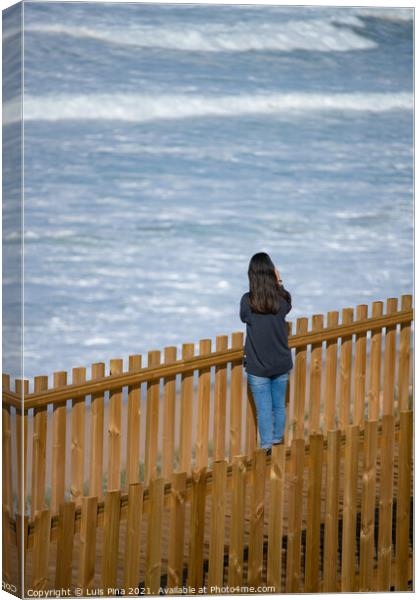 Woman traveler at Praia Azul beach in Torres Vedras, Portugal Canvas Print by Luis Pina