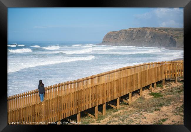 Woman traveler at Praia Azul beach in Torres Vedras, Portugal Framed Print by Luis Pina