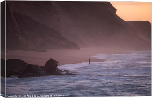 Fishermen in Santa Cruz beach at sunset, in Portugal Canvas Print by Luis Pina