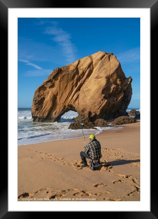 Fisherman in Praia de Santa Cruz beach rock boulder, Portugal Framed Mounted Print by Luis Pina