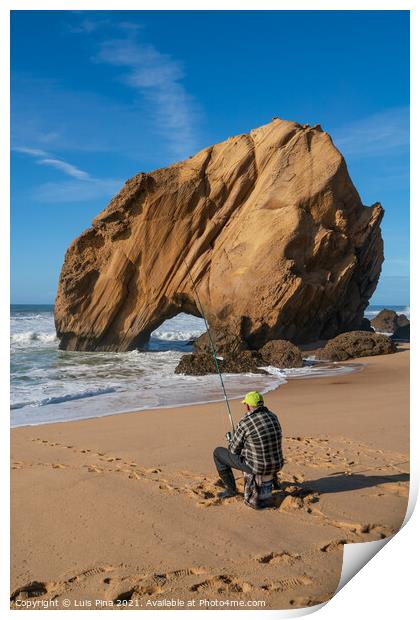 Fisherman in Praia de Santa Cruz beach rock boulder, Portugal Print by Luis Pina
