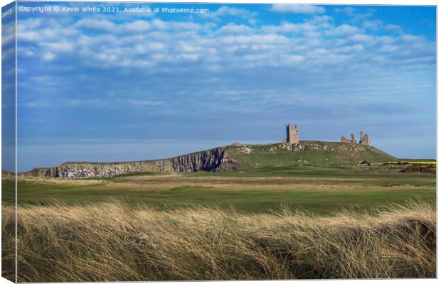 Dunstanburgh Castle from across golf course Canvas Print by Kevin White
