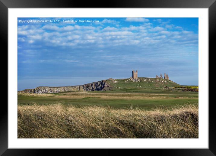 Dunstanburgh Castle from across golf course Framed Mounted Print by Kevin White