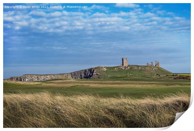 Dunstanburgh Castle from across golf course Print by Kevin White
