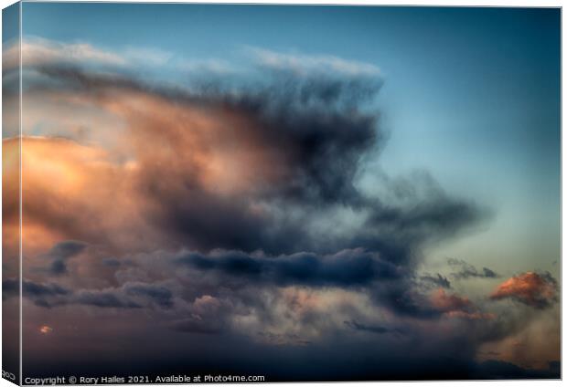 Clouds against a blue sky Canvas Print by Rory Hailes