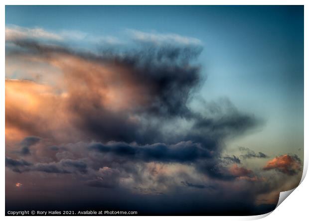 Clouds against a blue sky Print by Rory Hailes