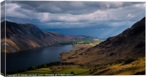Shaft of Light hitting Low Wood by Wast Water Canvas Print by Adrian Gavigan