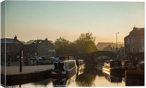 Lazy Hazy morning on the canal in Skipton Canvas Print by Richard Perks