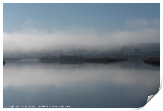 Fog river landscape at sunrise with low clouds and reflection on the water in Alcacer do Sal, Portugal Print by Luis Pina