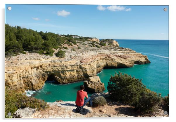 Man looking at a wild hidden secret beach with amazing turquoise water in Algarve, Portugal Acrylic by Luis Pina
