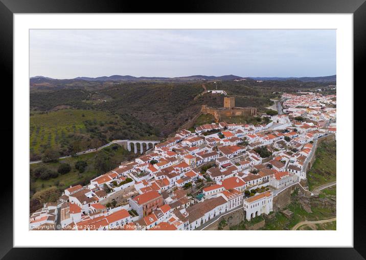 Mertola drone aerial view of the city and landscape with Guadiana river and medieval historic castle on the top in Alentejo, Portugal Framed Mounted Print by Luis Pina