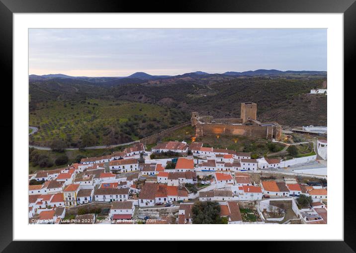 Mertola drone aerial view of the city and landscape with Guadiana river and medieval historic castle on the top in Alentejo, Portugal Framed Mounted Print by Luis Pina
