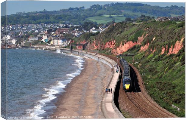 GWR train leaving Dawlish in South Devon  Canvas Print by Rosie Spooner