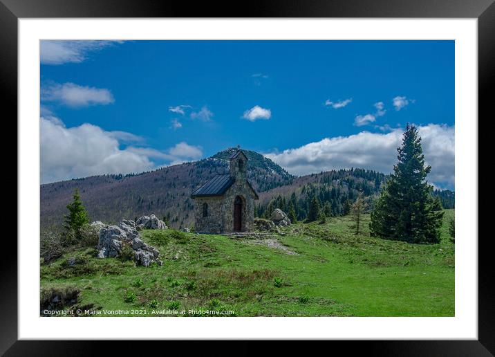 Stone chapel in mountains Framed Mounted Print by Maria Vonotna
