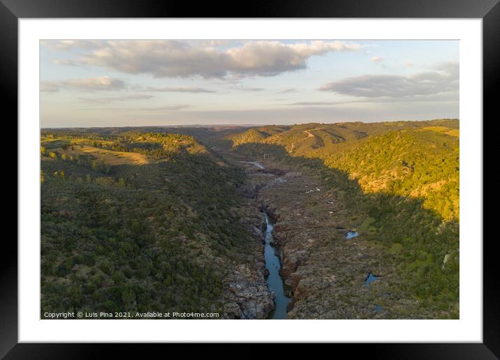 Pulo do Lobo waterfall drone aerial view with river guadiana and beautiful green valley landscape at sunset in Mertola Alentejo, Portugal Framed Mounted Print by Luis Pina