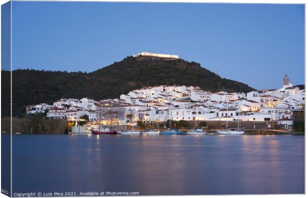 Sanlucar de Guadiana in Spain and Alcoutim in Portugal with sail boats on Guadiana river Canvas Print by Luis Pina