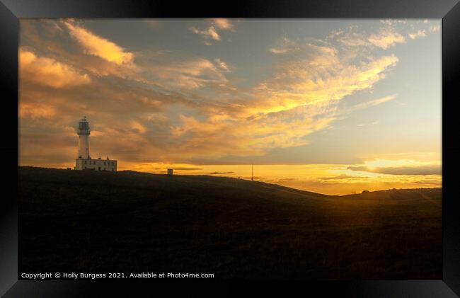 Flamborough Light house at sunset  Framed Print by Holly Burgess
