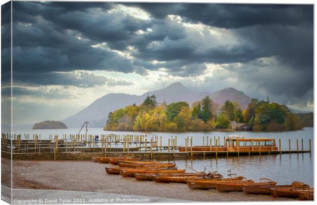 Boats on the shore of Derwent Water Canvas Print by David Tyrer