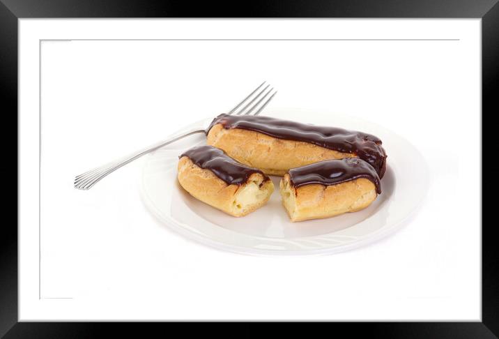 Two Chocolate Eclairs on a White Plate with a Fork Framed Mounted Print by Darryl Brooks