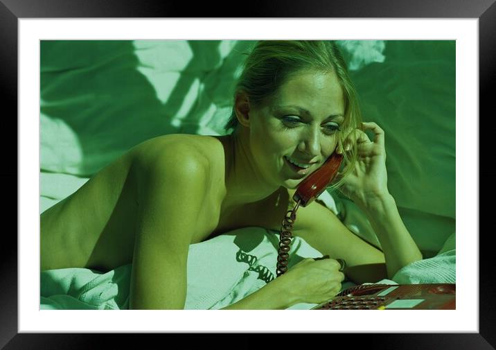 Hanging on the telephone.  Framed Mounted Print by Michael Snead