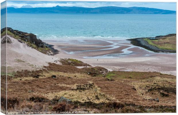 Sandy beach with view of Raasay and Isle of Skye Canvas Print by Angus McComiskey