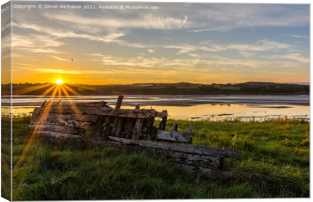 Sunset over the ships graveyard Canvas Print by Simon Nicholson