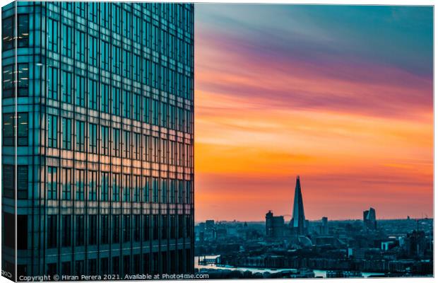 London skyline at sunset from Canary Wharf Canvas Print by Hiran Perera