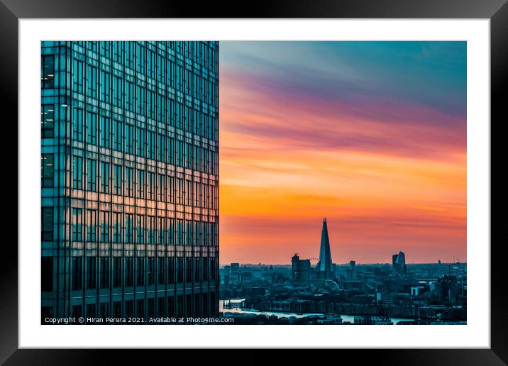 London skyline at sunset from Canary Wharf Framed Mounted Print by Hiran Perera