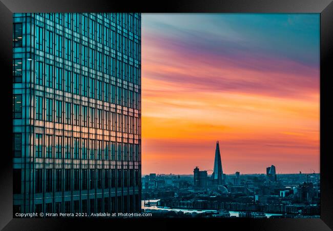 London skyline at sunset from Canary Wharf Framed Print by Hiran Perera