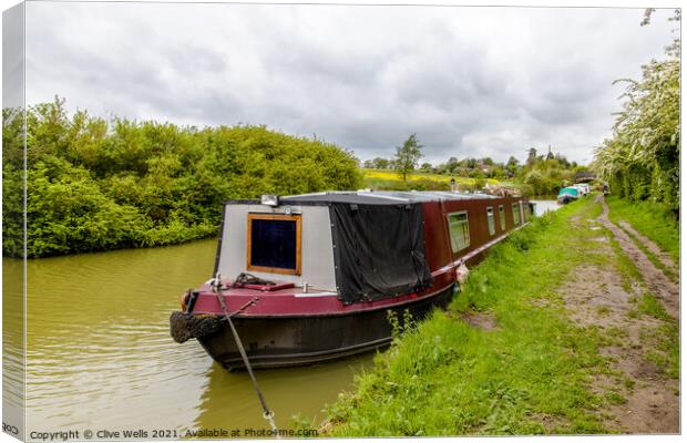 Narrow boat on the Grand Union Canal Canvas Print by Clive Wells