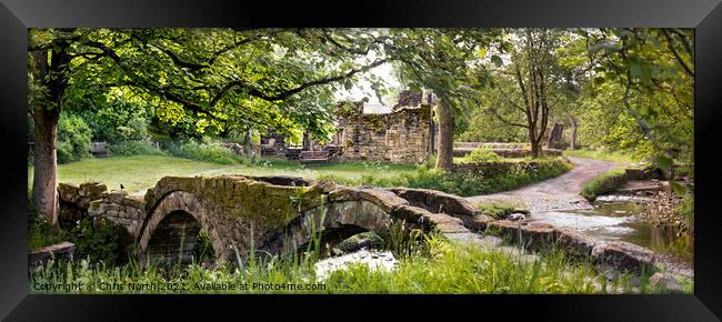 The Packhorse Bridge at Wycoller. Framed Print by Chris North